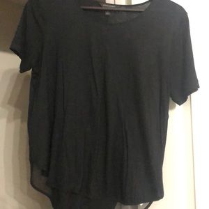 Black tee with side mesh detailing in the back